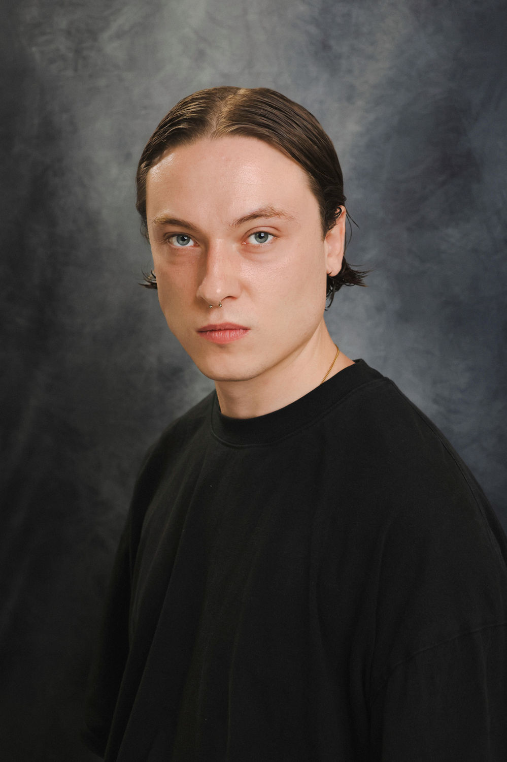 Actor headshot photographed at the Ceeb Moz studio in central London with soft natural lighting.